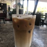 Oat milk iced latte  at The Lime Tree Cafe - Sheikh Zayed Road  in Dubai