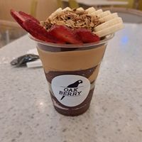 As many toppings as you want. I chose strawberries, banana, granola, peanut butter, pumpkin and chia seeds. at Oakberry - Mall Of the Emirates in Dubai