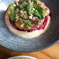 Whipped tahini, beets, citrus, mint, cacao nibs and pumpkin seeds. Delicious, inventive combination of flavors and textures! at Costa Media by Cafe Louis in Camden