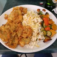 Mushrooms fried with chickpea flour , with rice and vegetables at Vege Fast Food in Split