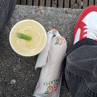 Passion fruit, mango and peace smoothie with a regular wrap at Go Falafel - Piccadilly Gardens in Manchester