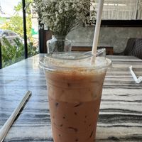 Thai iced tea with almond milk and oat milk foam    at Srisanor Boutique Hotel in Prachuap Khiri Khan
