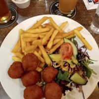 Pumpkin arancini with chips and salad at Adamstown Bowling Club in Adamstown