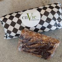 Wrap de couve e barrinha de cereal com chocolate deliciosa. at enVie A Vegan Kitchen in Halifax