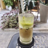 Matcha latte with oat milk and espresso shot at Corn Coffee in Da Nang
