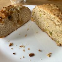 caramelized onion bun and leek and cheese scone (both cut in half) at Poppy Shop in Portland