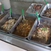 Variety of pre-made vegan dishes. at Jay Hong Restaurant in Surat Thani