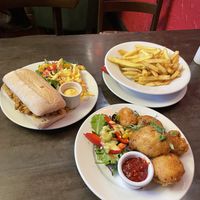 Cauliflower fritters, buffalo chickpea ciabatta sandwich & chips   at The Station Inn in Carnforth