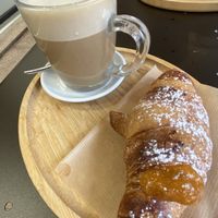 Apricot croissant with oat milk latte   at Middle Bistrot in Milan