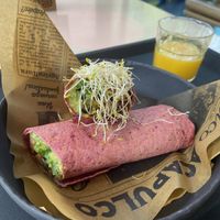Beetroot tortilla wrap and fresh orange juice. Both tasty, but the wrap was cold which I didn’t expect. It’s also quite spicy due to the jalapeno. at Museumcafé Centraal in Utrecht