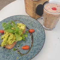 Avo toast and coconut yoghurt smoothie at Ohana Cafe in Cape Town