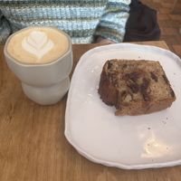 Banana bread and honey latte with oat milkk  at Helen's Book in Paris