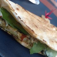 Sanduíche maravilhoso, com queijo de castanhas, tomates, pesto e rúcula at Lírio Café e Produtos Naturais in Sao Francisco De Paula