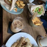 Pita sandwich (top right) veggie burger (top left) waffle, side of fries at Beach Muffin in Zushi