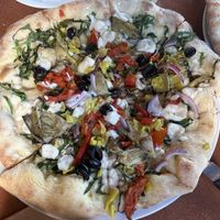 The Greek pizza with vegan feta instead of dairy cheese - very good!   at paesanos in Sacramento