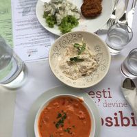 Gazpacho raw soup, icre de amaranth (vegan taramasalata), courgette patties with vegan tzatziki  at Rawdia in Bucharest