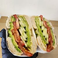 Homade Hummus with all the vegetables and avocado. Fresh and refreshing at Bagel's Dream in George Town