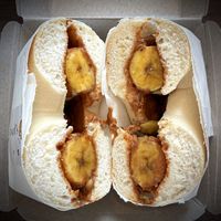 Plain Bagel with Peanut Butter 🥜 and Banana 🍌 The peanut butter is homemade and contains no sugar or oil. Ordered through GrabFood.  at Bagel's Dream in George Town