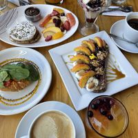 Tofu stuffed medialuna was superb, oat parfait was delicious, pb toast replaced cakes since they didn’t have any😒 at Inefable Libros y Café in San Carlos De Bariloche