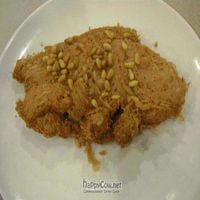 Taro fish is an entree of seasoned taro paste formed in a mold, sprinkled with pine nuts. Good, flavorful, and filling. at The Original Buddha Bodai - Kosher Vegetarian Restaurant in New York City