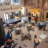 The common seating area at the Sherman Phoenix. Grab your food and hang out here. at Planted Vibes in Milwaukee