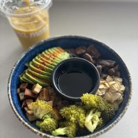 Teriyaki tofu bowl and turmeric mango smoothie   at Mora Mora  in Mexico City