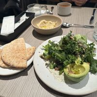 Avocado salad. Hummus and pita  at plant more in Tokyo