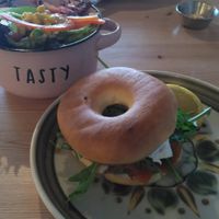 Carrot Lox Bagel with a side salad and coleslaw at Mad Cucumber in Bournemouth