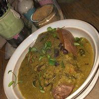 Baked sweet potato with lentil Dahl  at Mad Cucumber in Bournemouth