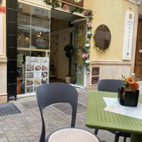 In and out sitting  at Sentir Café in Malaga