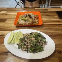 Papaya salad (up) Lao style duck salad (down)  at White Lotus Vegetarian Restaurant in Vientiane