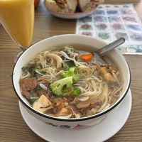 Yellow noodle soup  at White Lotus Vegetarian Restaurant in Vientiane