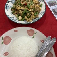 Basil pork stir fry with rice  at White Lotus Vegetarian Restaurant in Vientiane