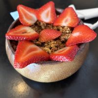 CARIOCA
Acai bowl with strawberries and homemade walnut granola  at Projeto Acai - SZR  in Dubai