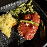 Impossible meatloaf with garlic green beans, herb and roasted garlic mashed potatoes with mushroom gravy   at Everything POP Shopping & Dining in Lake Buena Vista