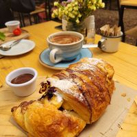 breakfast: chocolate croissant with hot chocolate at Green Point in Cusco