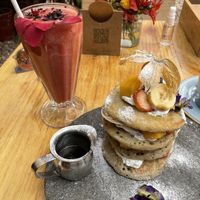 Banana pancakes and strawberry juice  at Green Point in Cusco