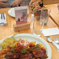 Grillplatter and Tacos in the background at Green Point in Cusco
