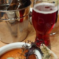 Cream of tomato soup and home brewed blueberry cider at Green Point in Cusco