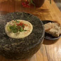 bread and hummus appetiser   at Green Point in Cusco