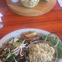 Peruvian stir fly! My friend got the burger! at Green Point in Cusco