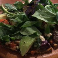Raw vegan pizza (recommend)  at Green Point in Cusco