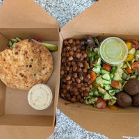 Falafel Pita and Mediterranean Cobb Salad. Both easily modified to be vegan. at Shuk Savannah in Savannah