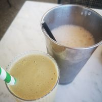 Mango Magic Smoothie & Caramel Veganshake at 2 Pugs Coffee & Kitchen in Meadow Springs
