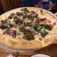 Vegan special with tomatoes,  balsamic portobello mushrooms, and crispy kale! at Flatbread Company in North Conway