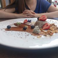 Dessert: raw coffee icecream with granola and fruit at Plevel in Prague