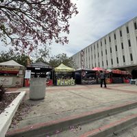 half of the market (includes stalls with labeled vegan jackfruit pozole, two sandwiches with vegan cheese, veggie sushi, and lemonade)   at SDSU Farmer's Market in San Diego