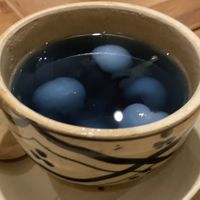 This was quite interesting. Butterfly pea flower tea soup(?) and lychee fruits in it.   at Du Du Xanh in Ho Chi Minh City