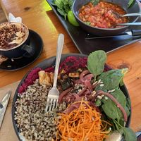 Already ate from it, oops! Chickpea shakshuka and Buddha bowl.   at The Greenhouse in Nightcliff