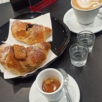 Brioche con nocciolata e crema di Lotus vegane. Cappuccino con latte di cocco at Caffè Ventuno in Buttigliera Alta